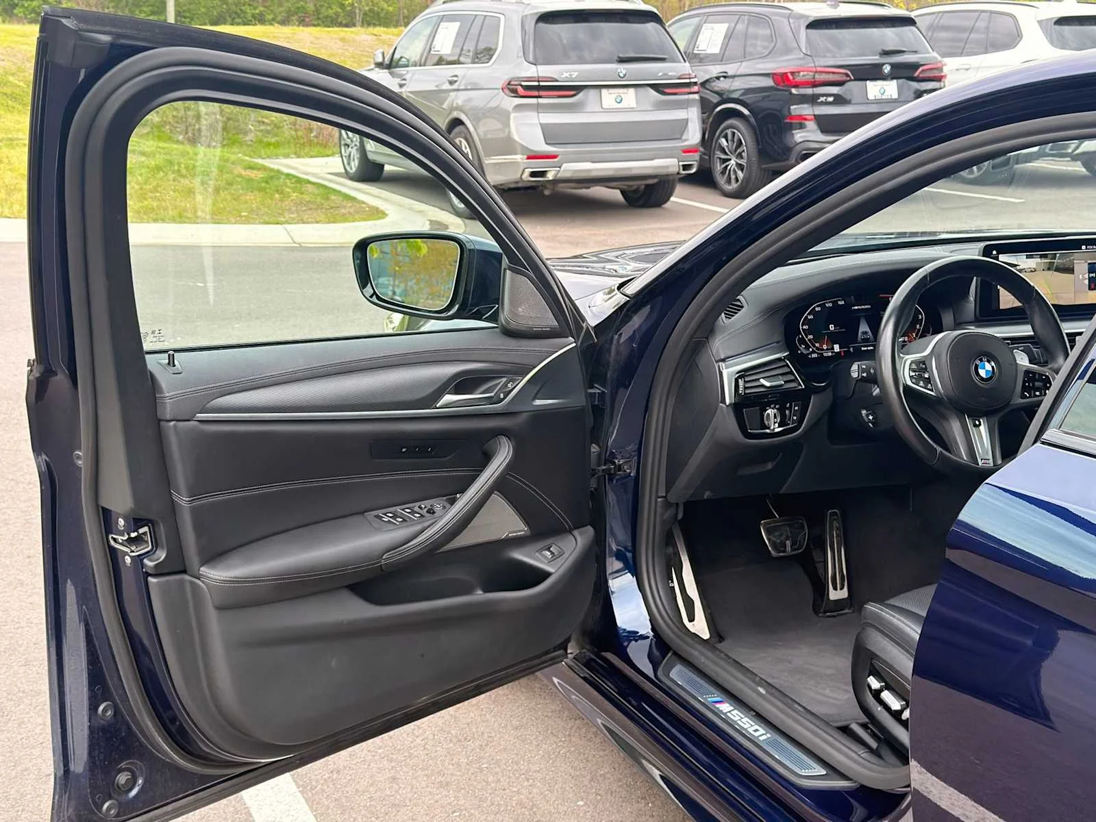 Used 2022 Tanzanite Blue II Metallic BMW M550i xDrive image 12