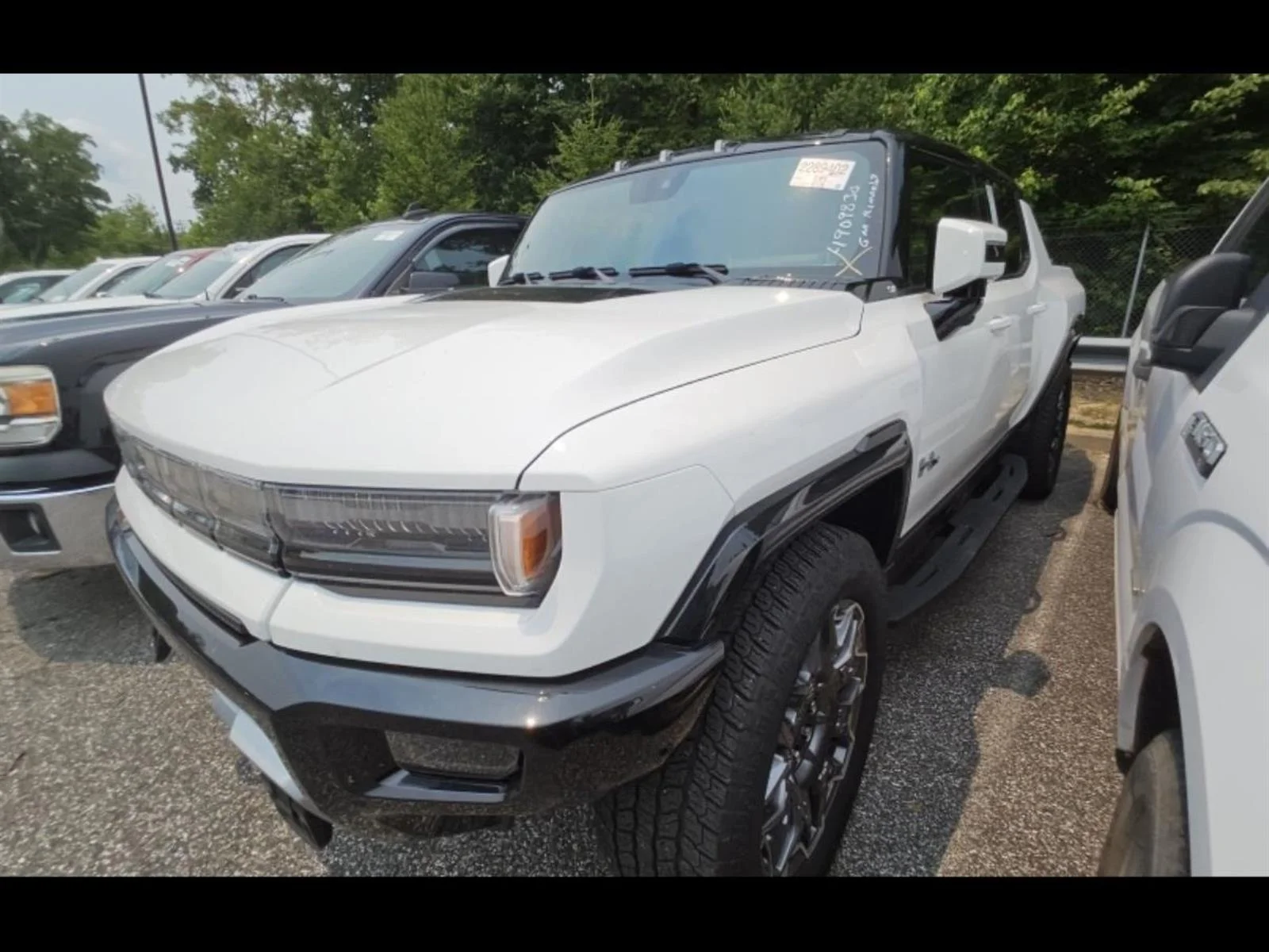 Used 2025 Interstellar White GMC 3X image 1