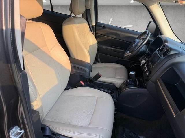 Used 2016 Granite Crystal Clearcoat Metallic Jeep Sport image 25