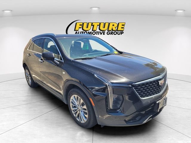 Used 2024 Black Cadillac Premium Luxury image 1