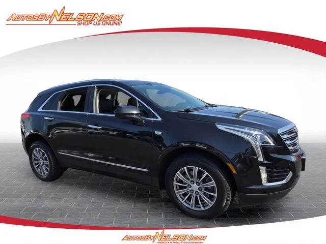 Used 2018 Black Cadillac Luxury image 1