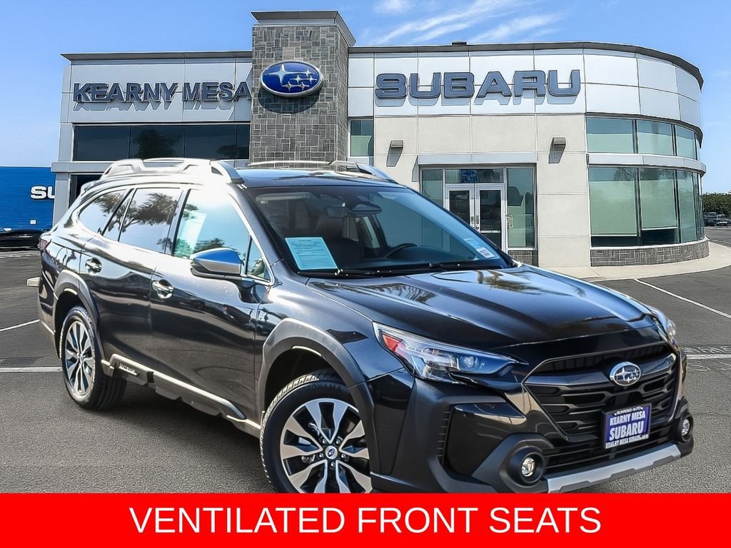 Used 2024 Black Subaru Touring image 1