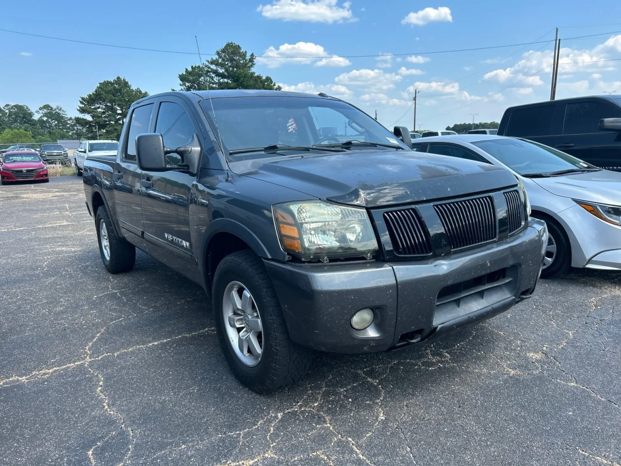 Used 2012 Nissan Titan PRO-4X with VIN 1N6BA0EC9CN315473 for sale in Collins, MS