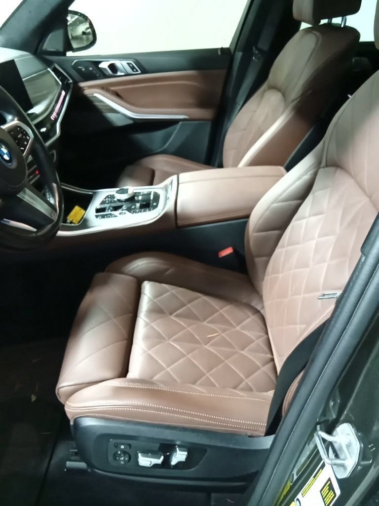Used 2024 Manhattan Green Metallic BMW xDrive50e image 9