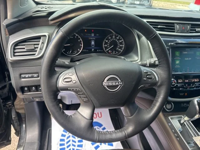 Used 2024 Super Black Nissan Platinum image 14