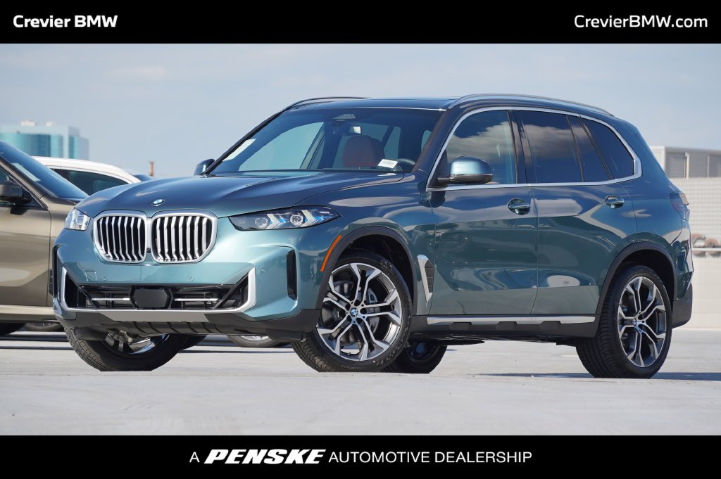 Used 2026 Blue Ridge Mountain Metallic BMW sDrive40i image 1