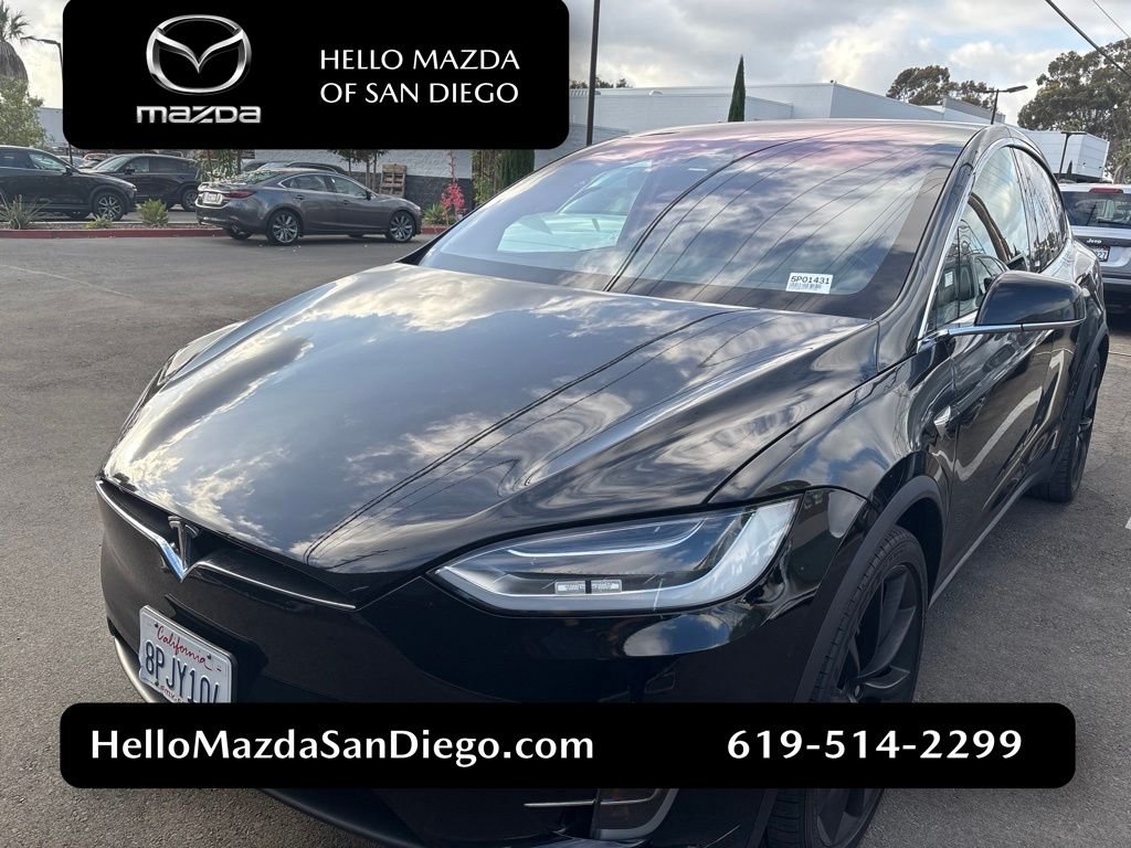 Used 2018 Solid Black Tesla 75D image 1