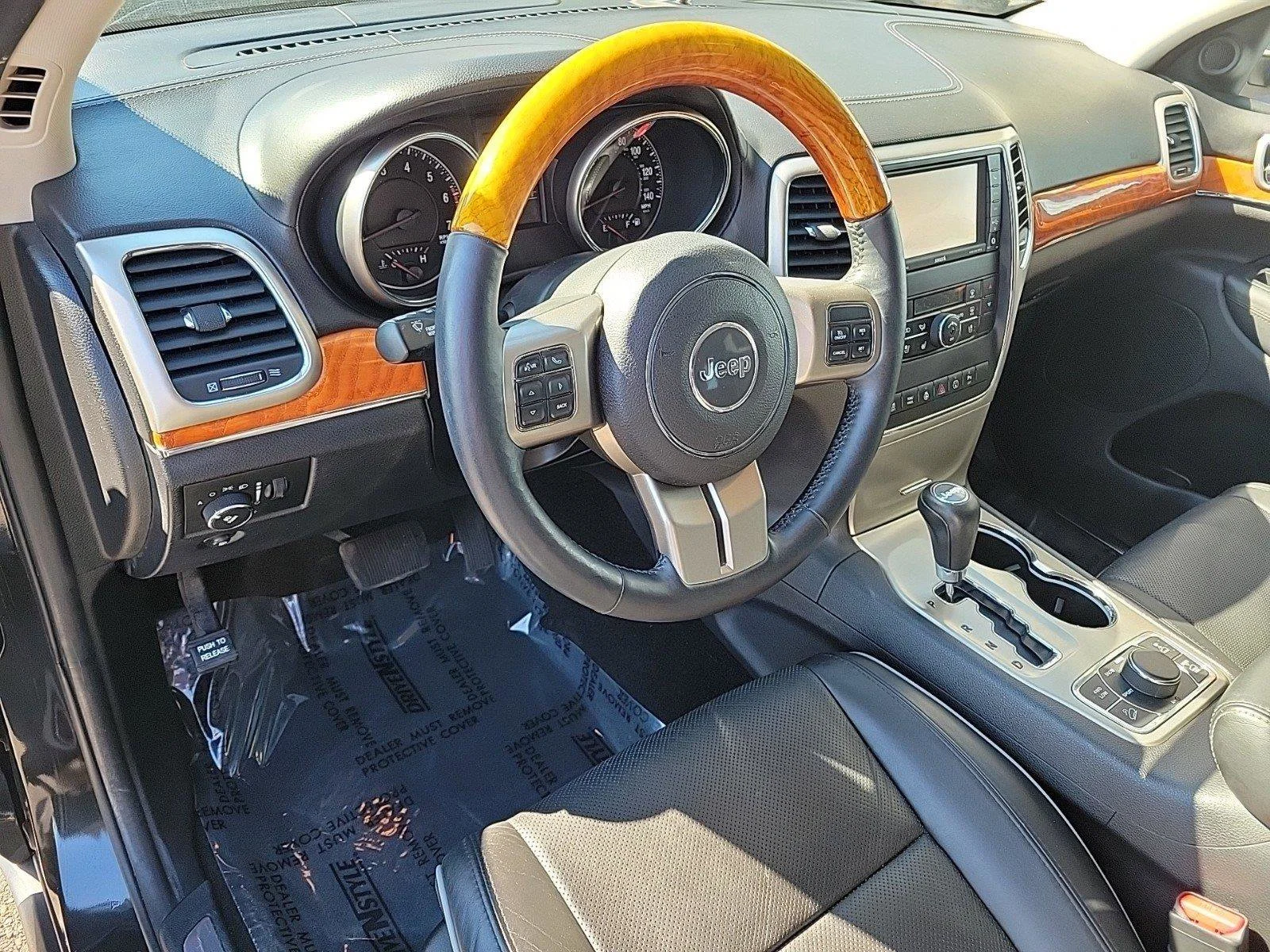 Used 2013 Brilliant Black Crystal Pearl Jeep Overland image 13