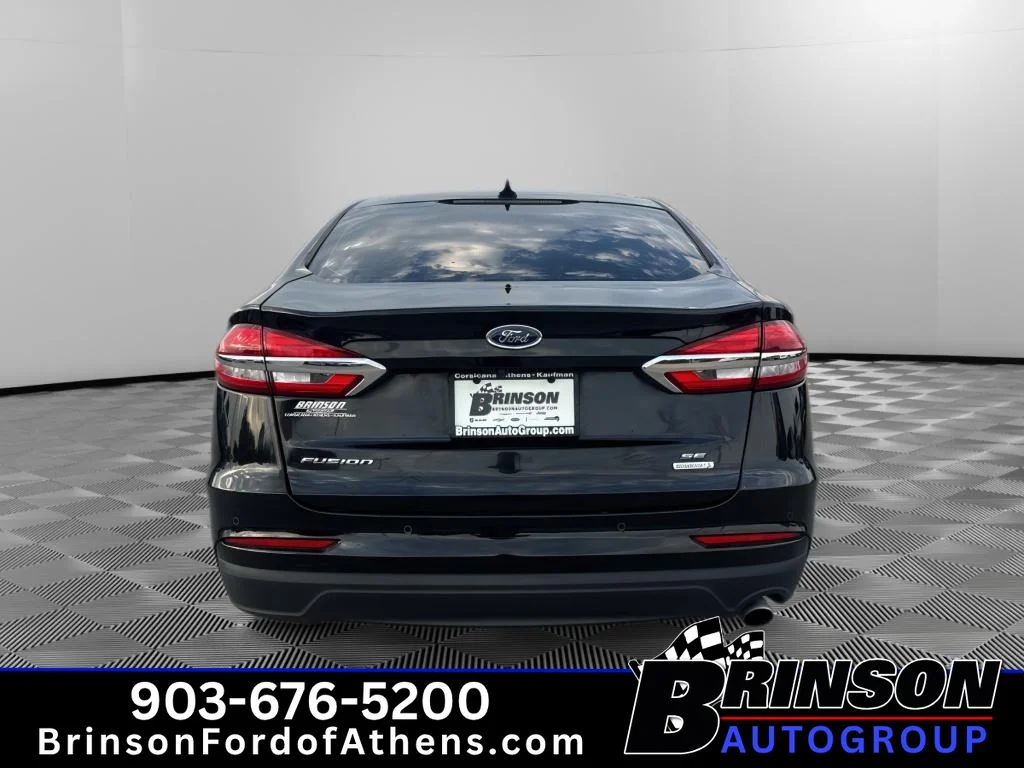 Used 2020 Agate Black Metallic Ford SE image 6
