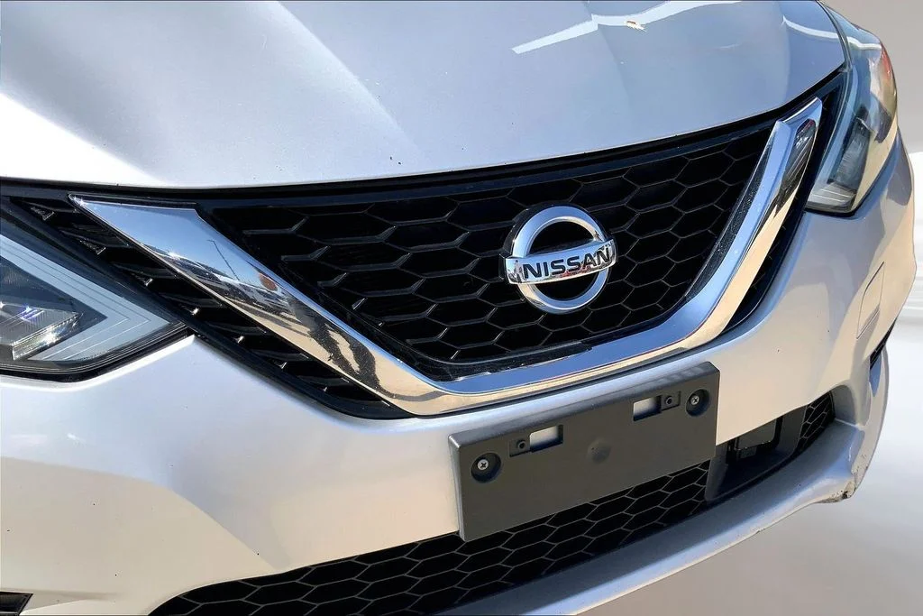 Used 2018 Brilliant Silver Metallic Nissan S image 26
