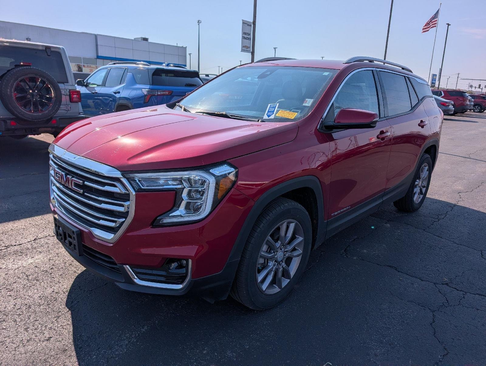 Used 2023 Volcanic Red Tintcoat GMC SLT image 4