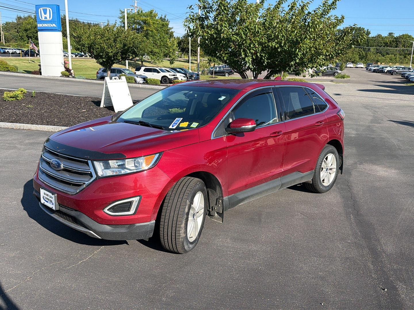 Used 2018 Ruby Red Metallic Tinted Clearcoat Ford SEL image 3