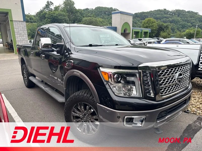 Used 2016 Black Nissan Platinum Reserve image 1