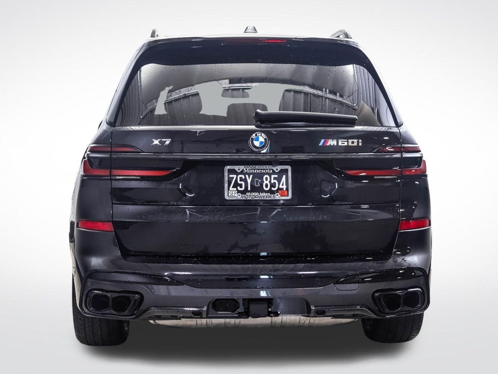 Used 2026 Black Sapphire Metallic BMW M60i image 4