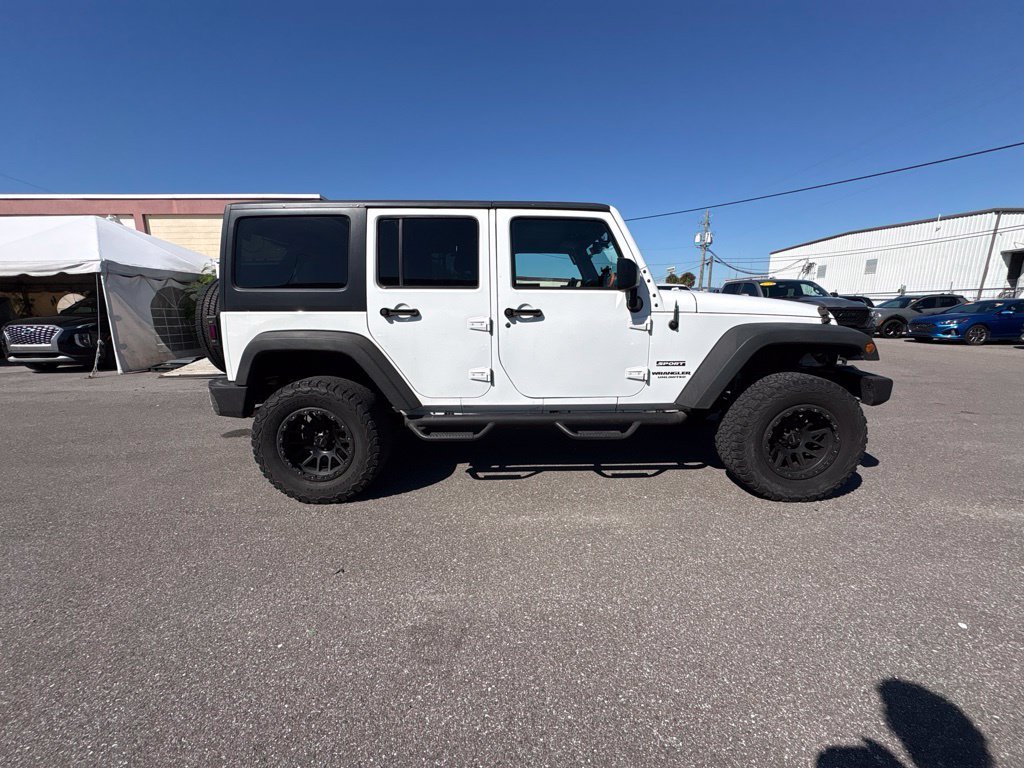 Used 2016 White Jeep Unlimited Sport image 2