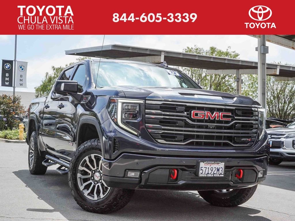 Used 2022 Titanium GMC AT4 image 1