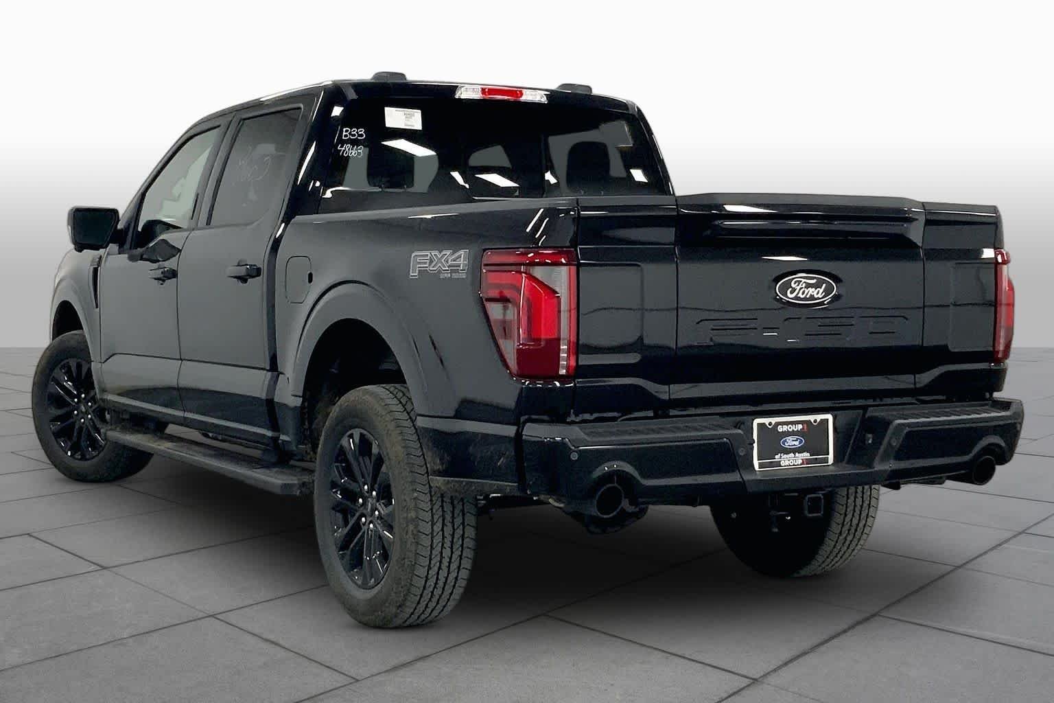 New 2026 Agate Black Metallic Ford Lariat® image 11