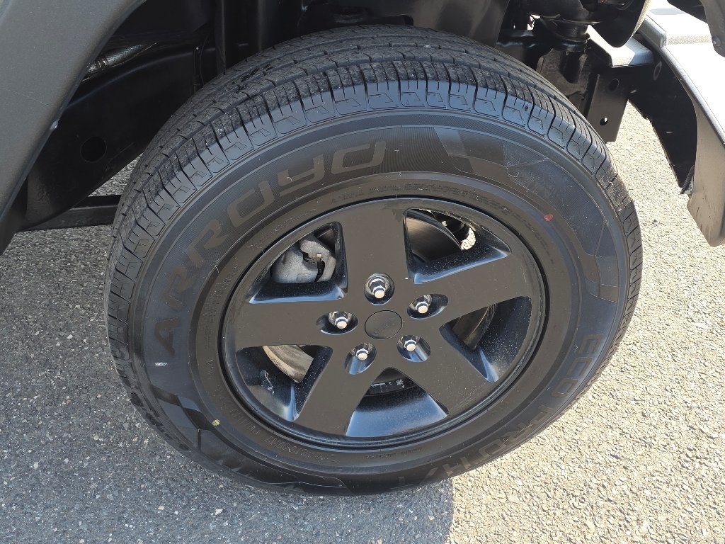 Used 2016 Granite Crystal Metallic Clear Coat Jeep Sport image 19