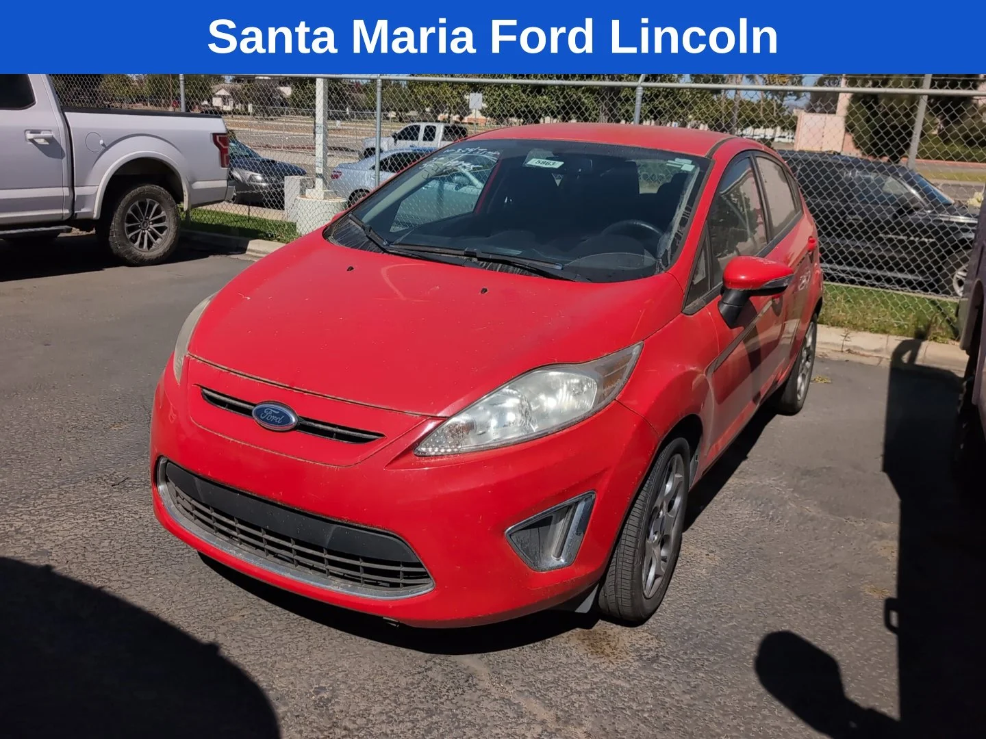 Used 2012 Race Red Ford SES image 1