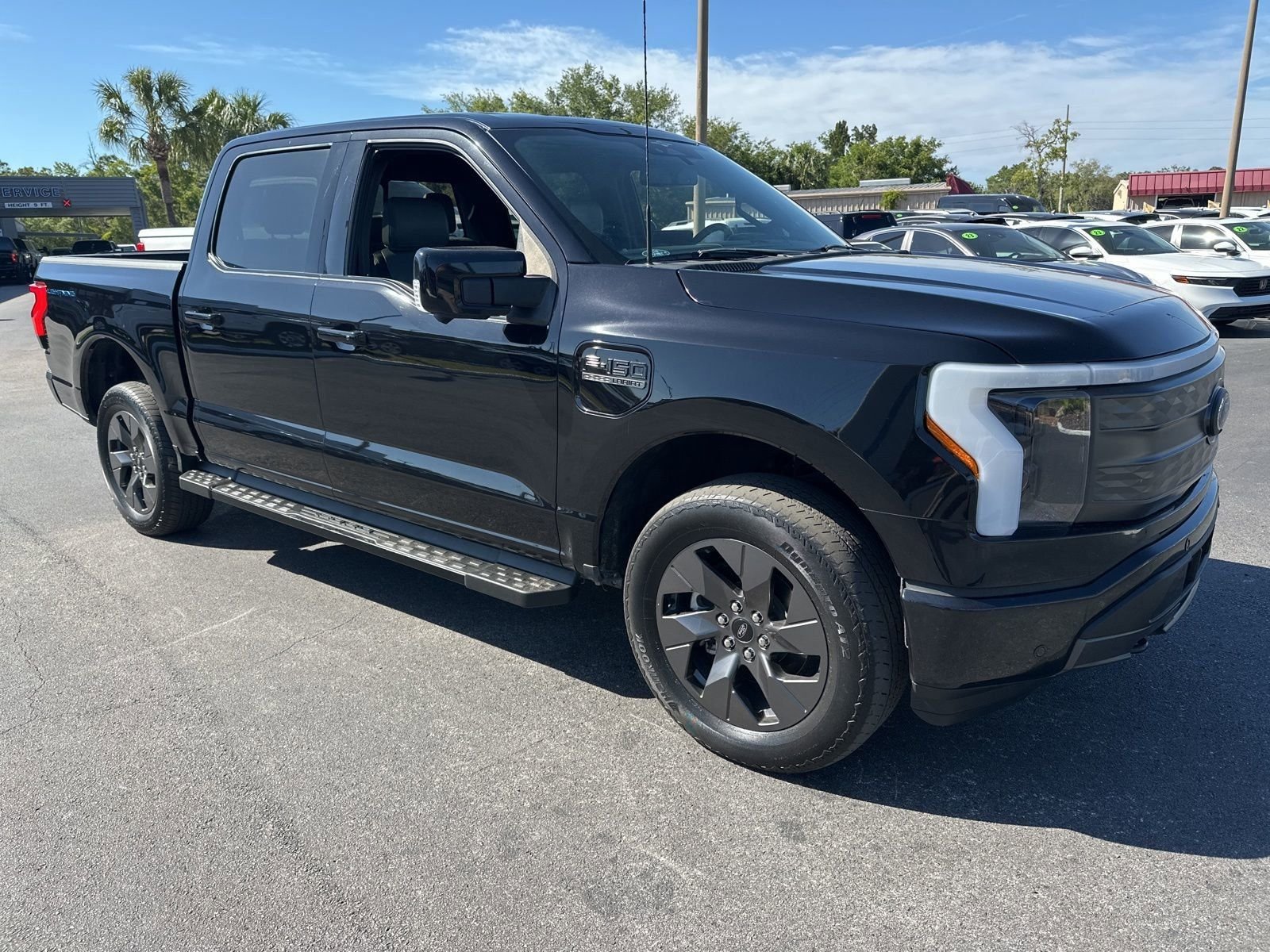 Used 2023 Ford F-150 Lightning Lariat with VIN 1FTVW1ELXPWG06412 for sale in Spring Hill, FL