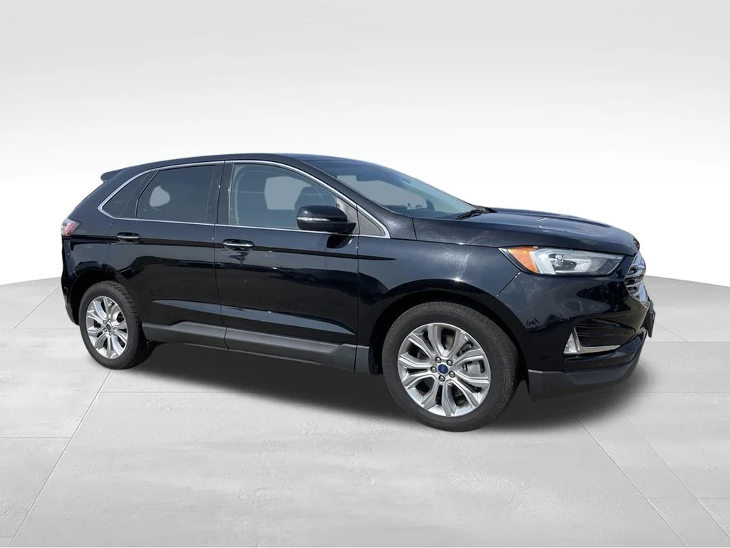 Used 2021 Black Metallic Ford Titanium image 2
