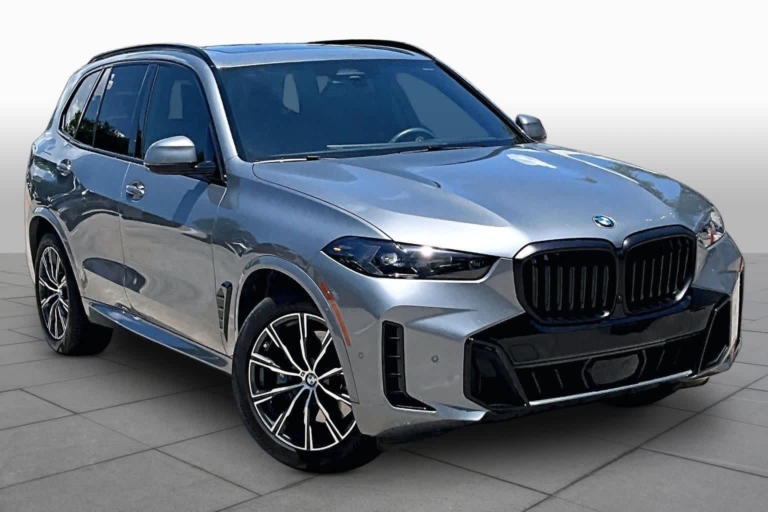 Used 2024 Skyscraper Grey Metallic BMW xDrive40i image 2