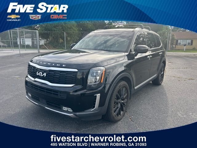 Used 2022 Black Kia SX image 1