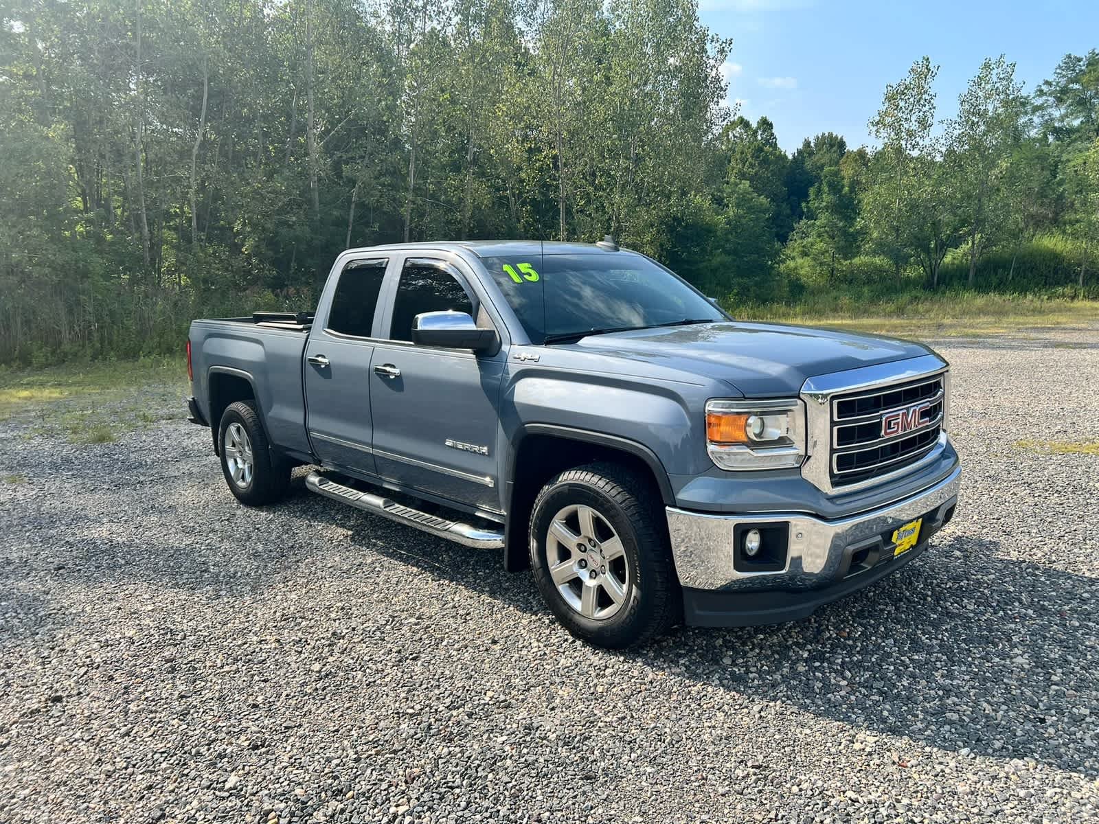 Used 2015 LIGHT STEEL GRAY METALLIC GMC SLT image 1