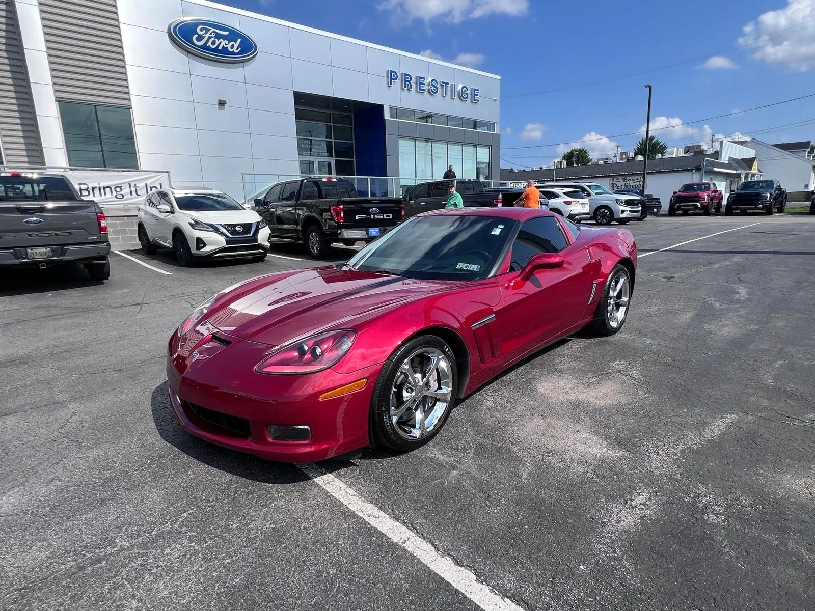 Used 2012 Crystal Red Tintcoat Chevrolet Grand Sport image 5