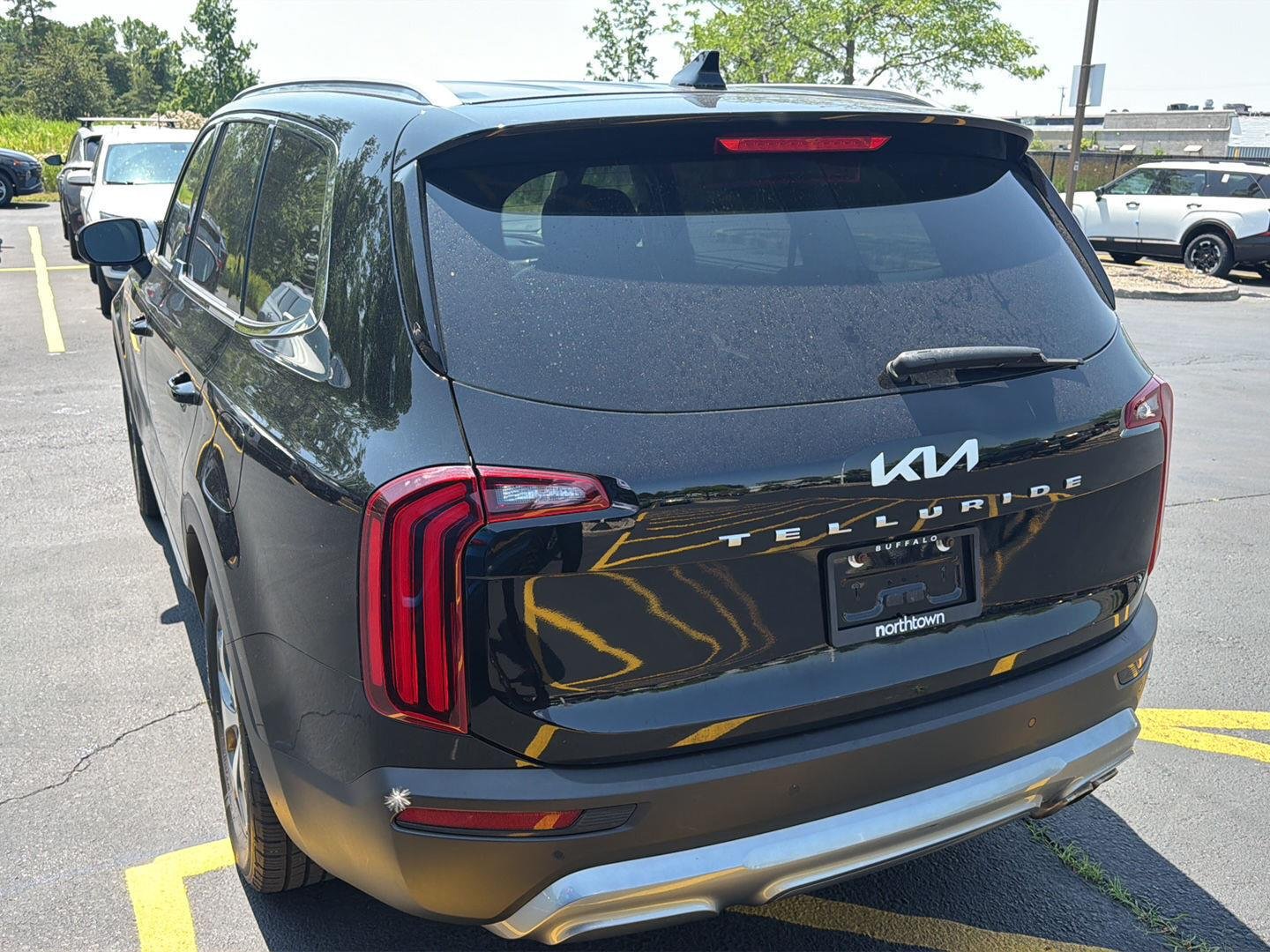 Used 2022 Ebony Black Kia EX image 4