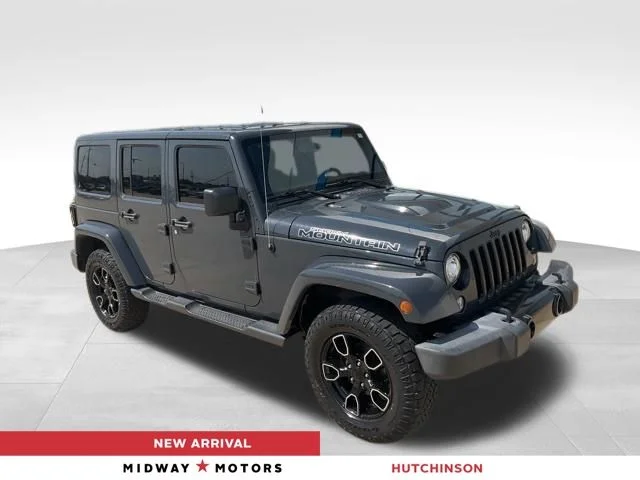 Used 2017 Black Jeep Unlimited Sahara image 1
