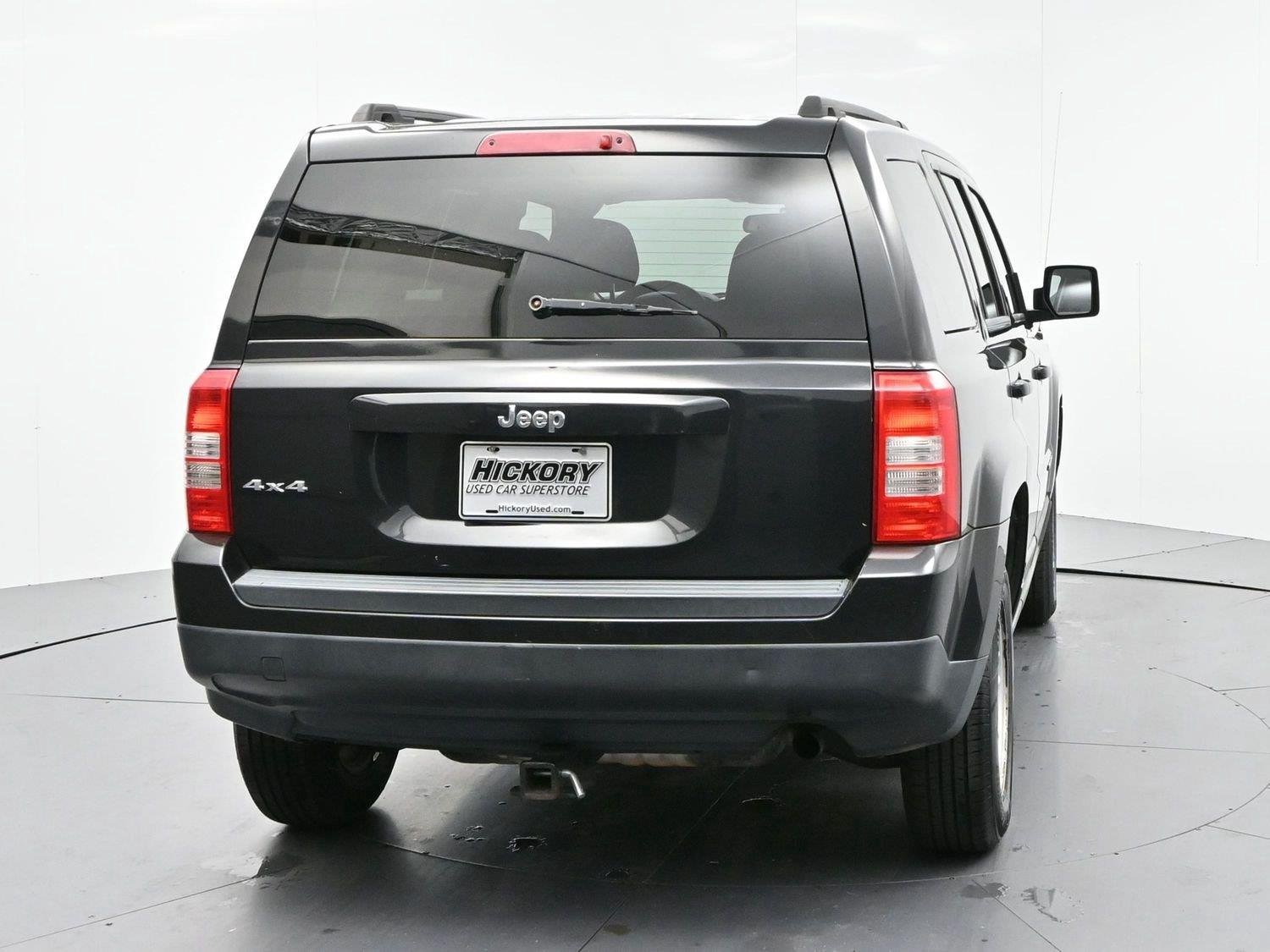 Used 2011 Brilliant Black Crystal Pearl Jeep Sport image 6