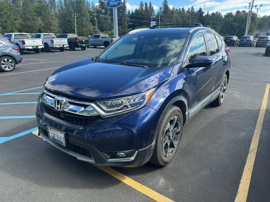 Used 2019 Obsidian Blue Pearl Honda Touring image 1