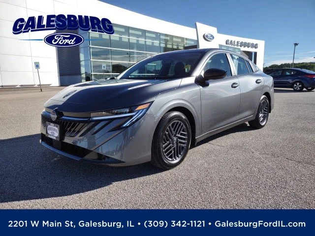 Used 2027 Gun Metallic Nissan SV image 1