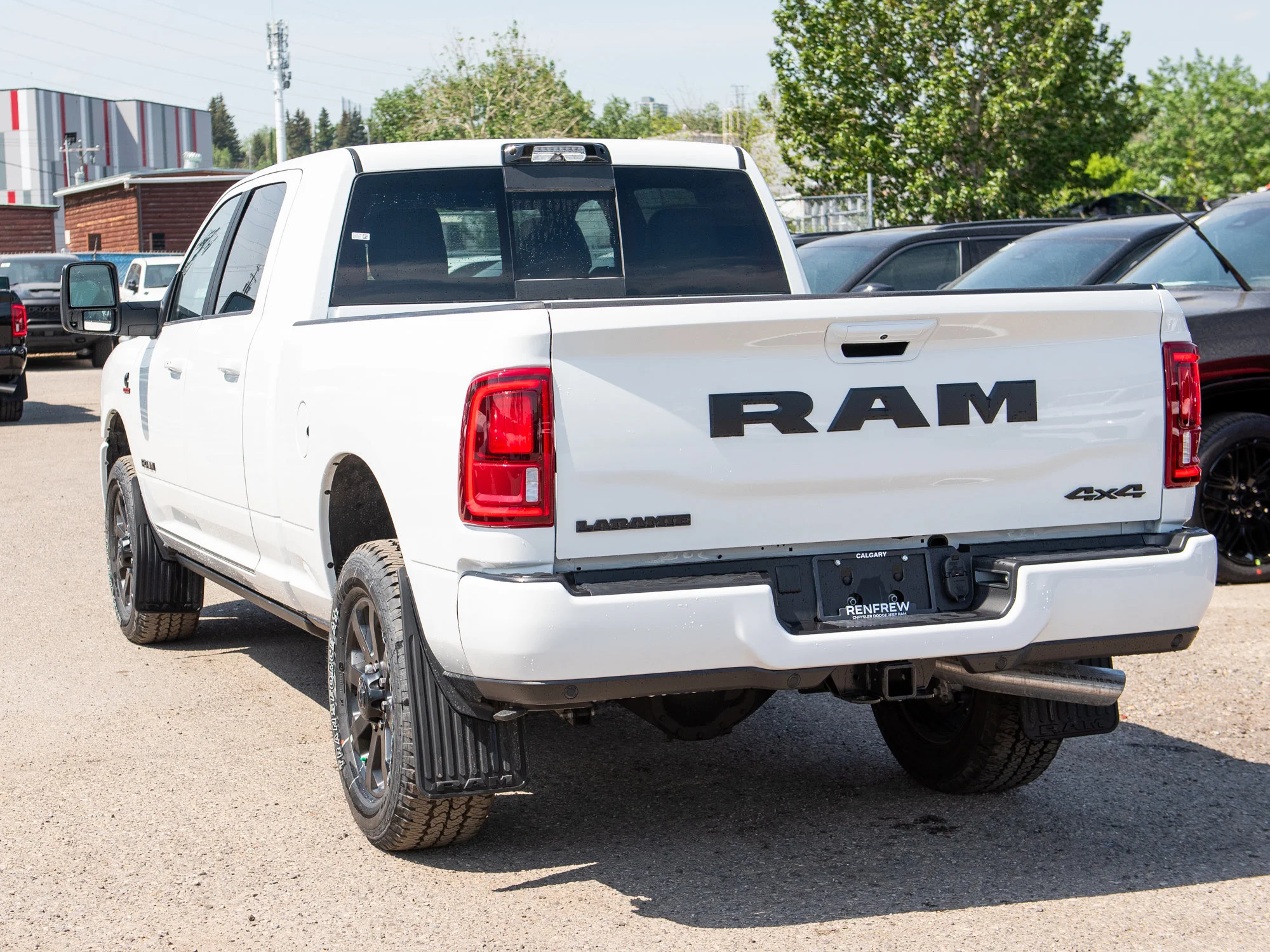 New 2026 White RAM Laramie* image 4