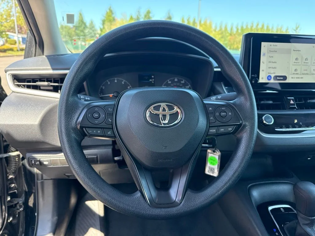 Used 2024 Midnight Black Metallic Toyota LE image 12