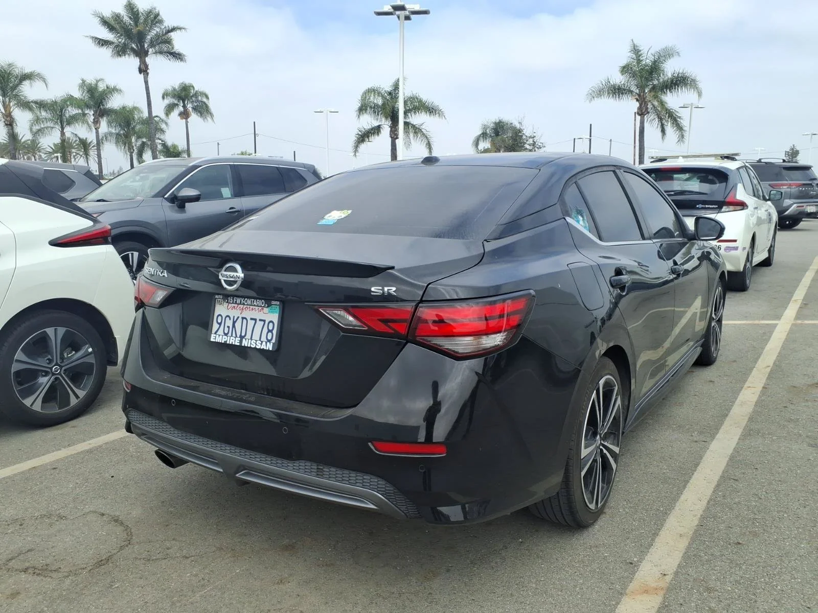 Certified Used 2023 Super Black Nissan SR image 5