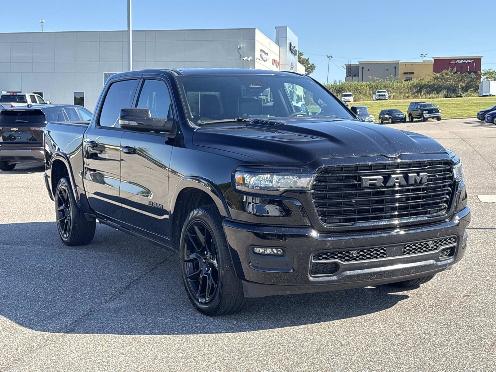 Used 2025 Diamond Black Crystal Pearlcoat Ram Laramie image 3