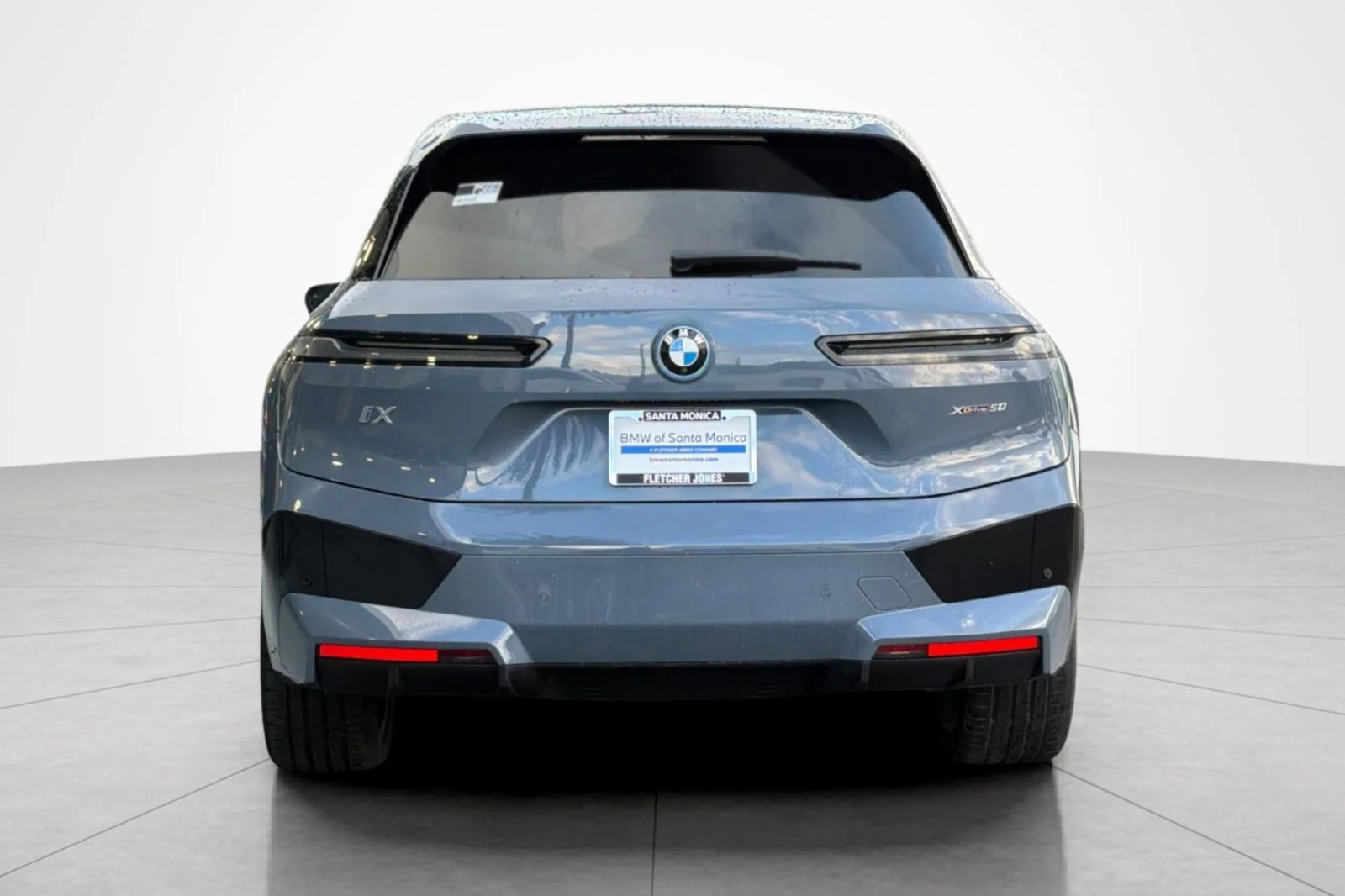 Used 2024 Storm Bay Metallic BMW xDrive50 image 4