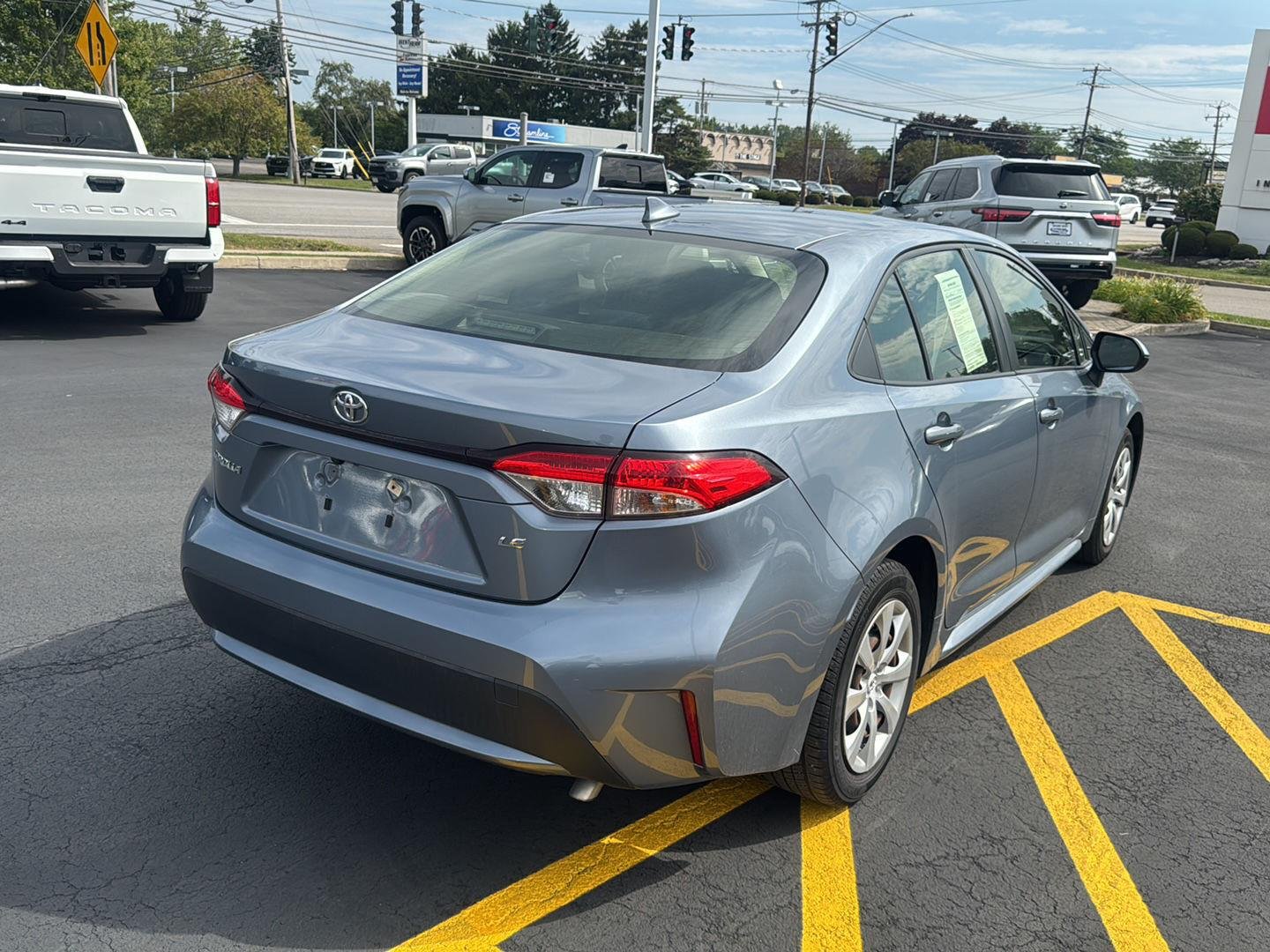 Used 2020 Celestite Gray Metallic Toyota LE image 6