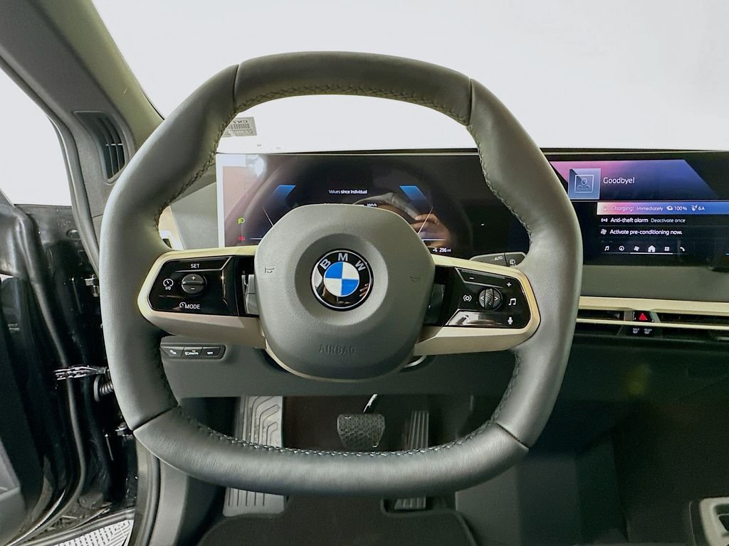 Used 2026 Black Sapphire Metallic BMW xDrive60 image 10