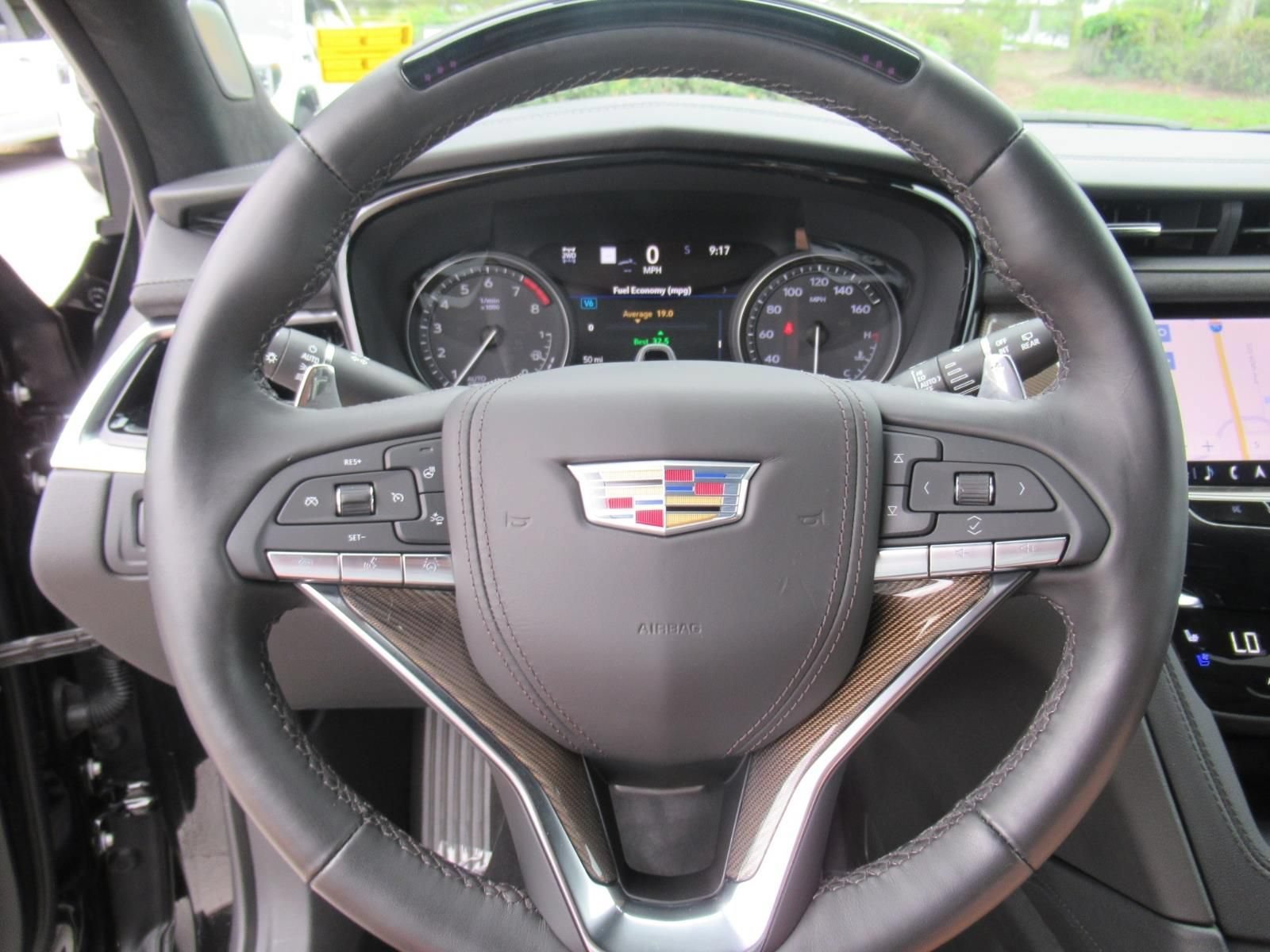 Certified Used 2025 Stellar Black Metallic Cadillac Sport image 24