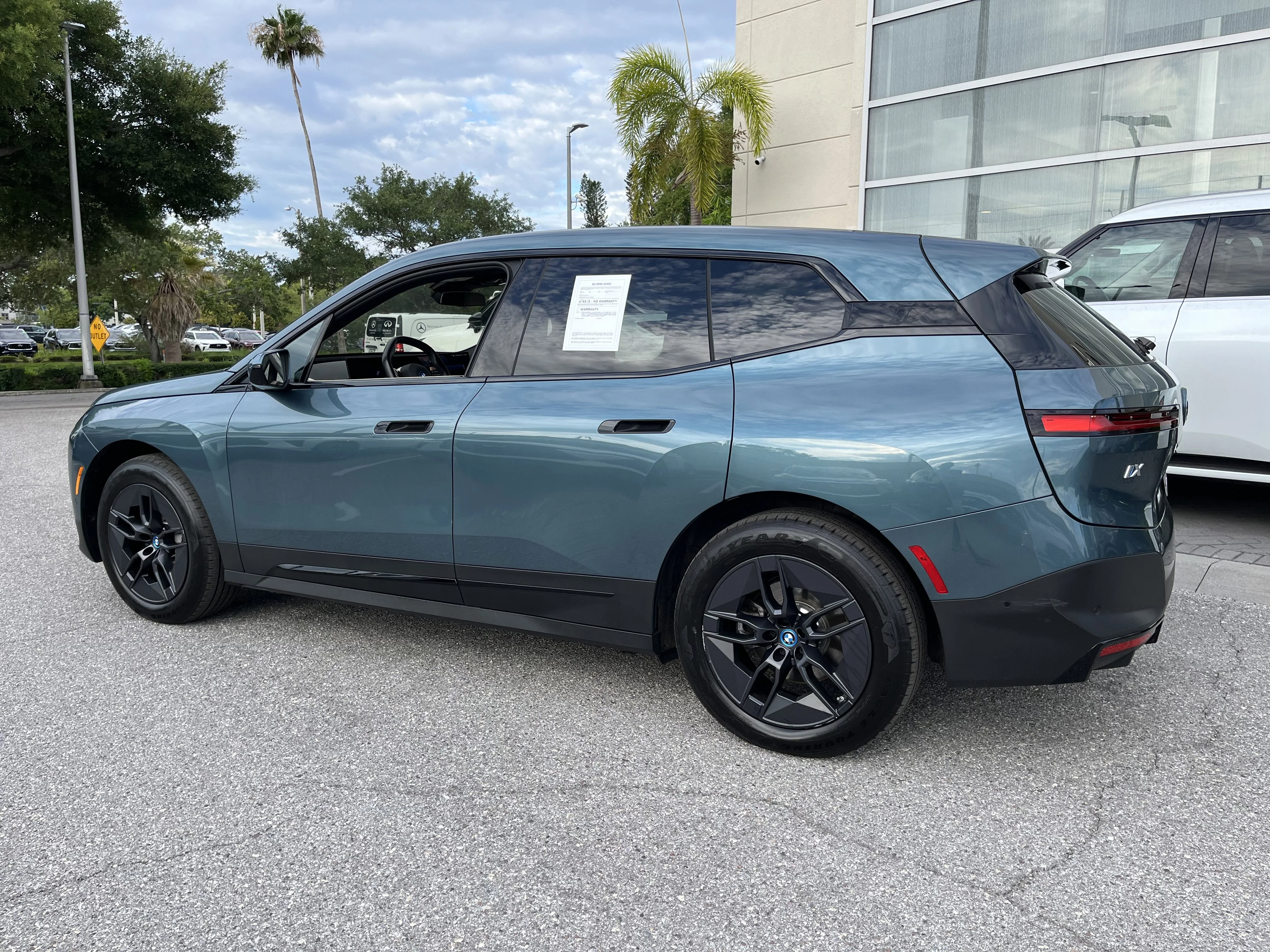 Used 2025 Blue Ridge Mountain Metallic BMW xDrive50 image 7