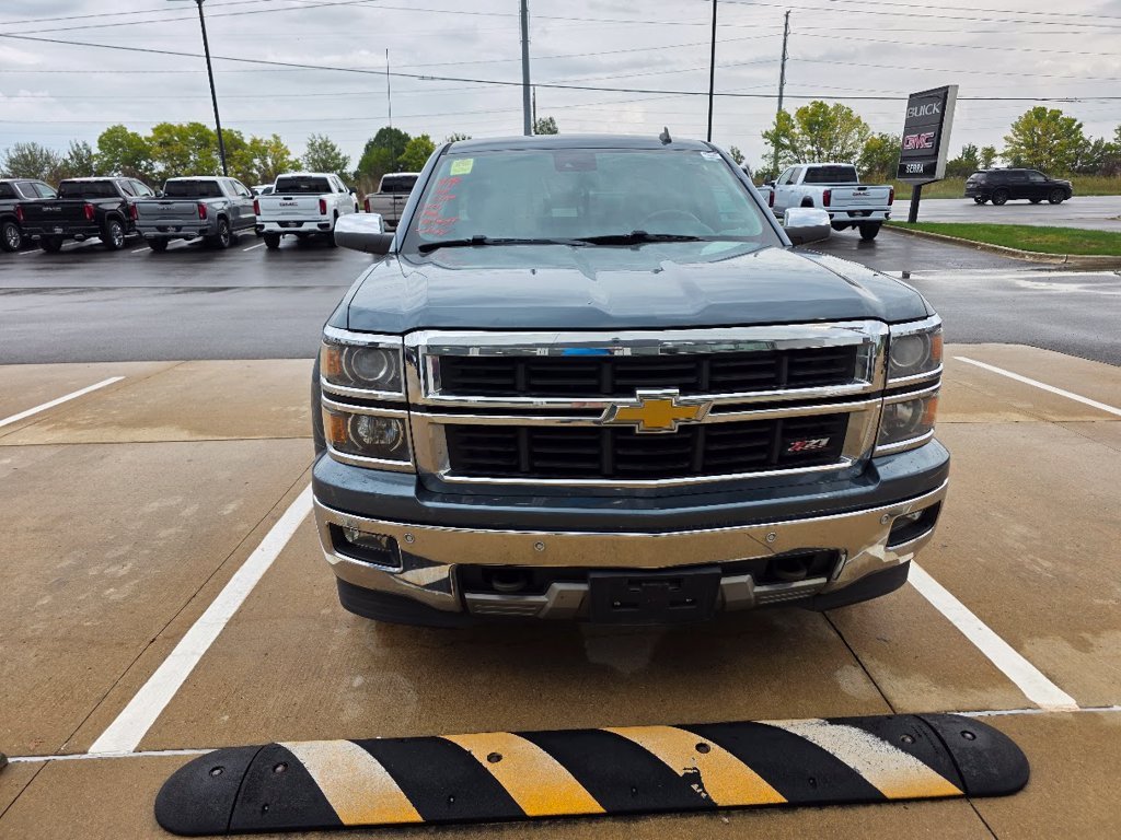 Used 2014 BLUE GRANITE METALLIC Chevrolet LTZ image 1