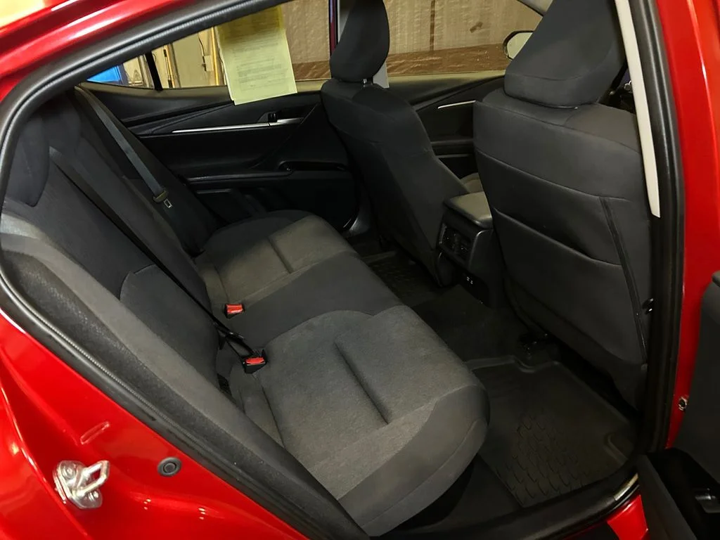 Used 2025 Supersonic Red Toyota LE image 17