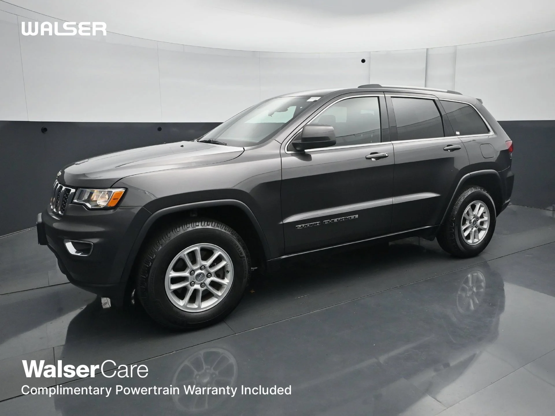 Used 2020 Granite Crystal Metallic Clearcoat Jeep Laredo E image 1
