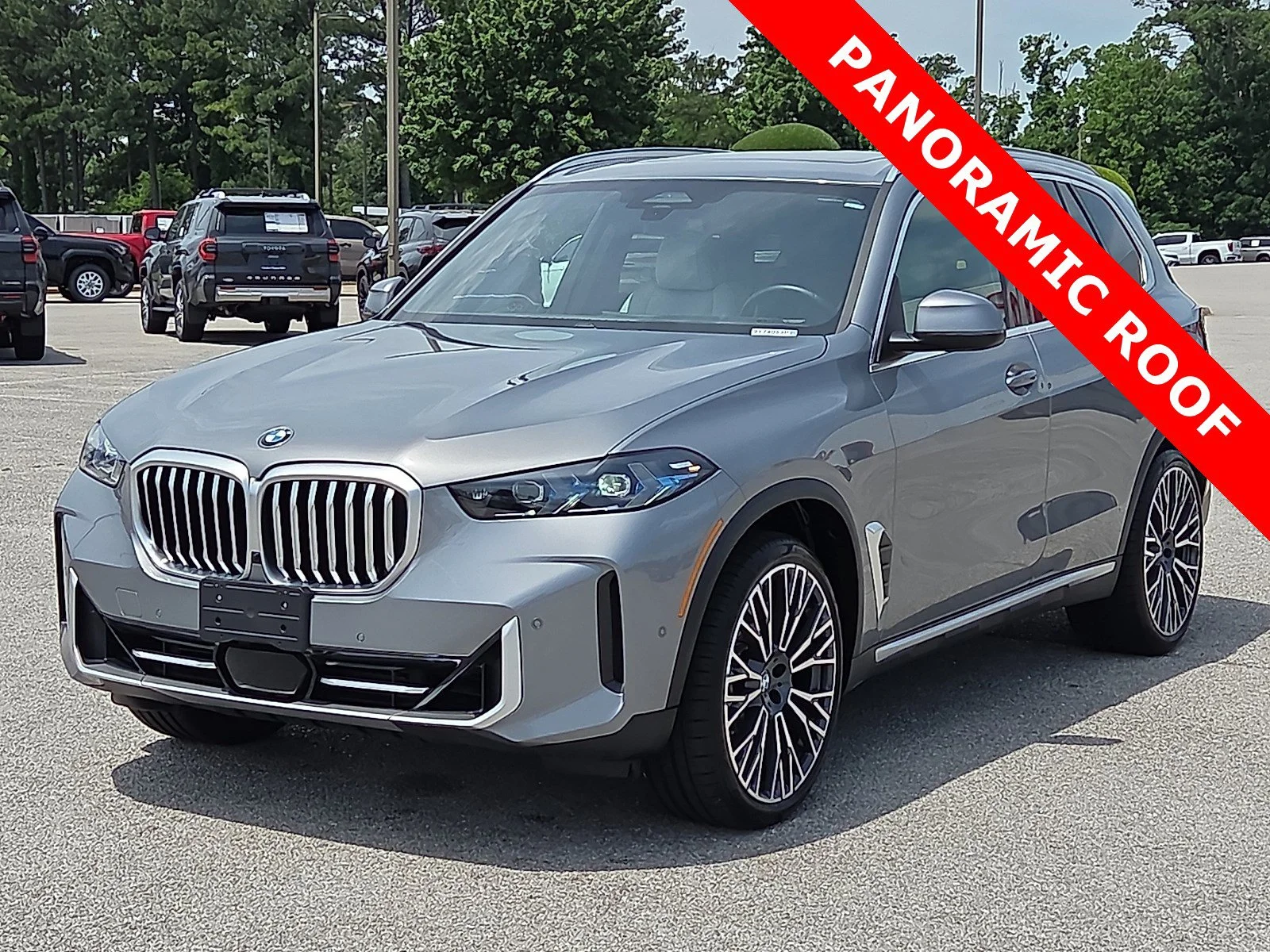 Used 2025 Skyscraper Grey Metallic BMW xDrive40i image 2