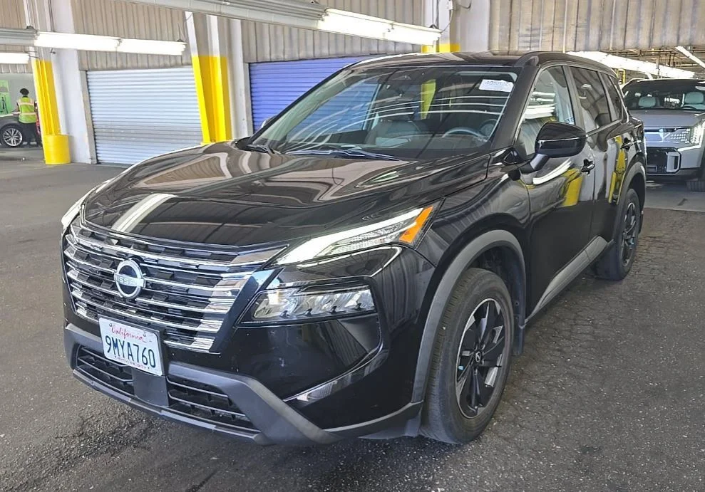 Used 2024 Black Nissan SV image 1