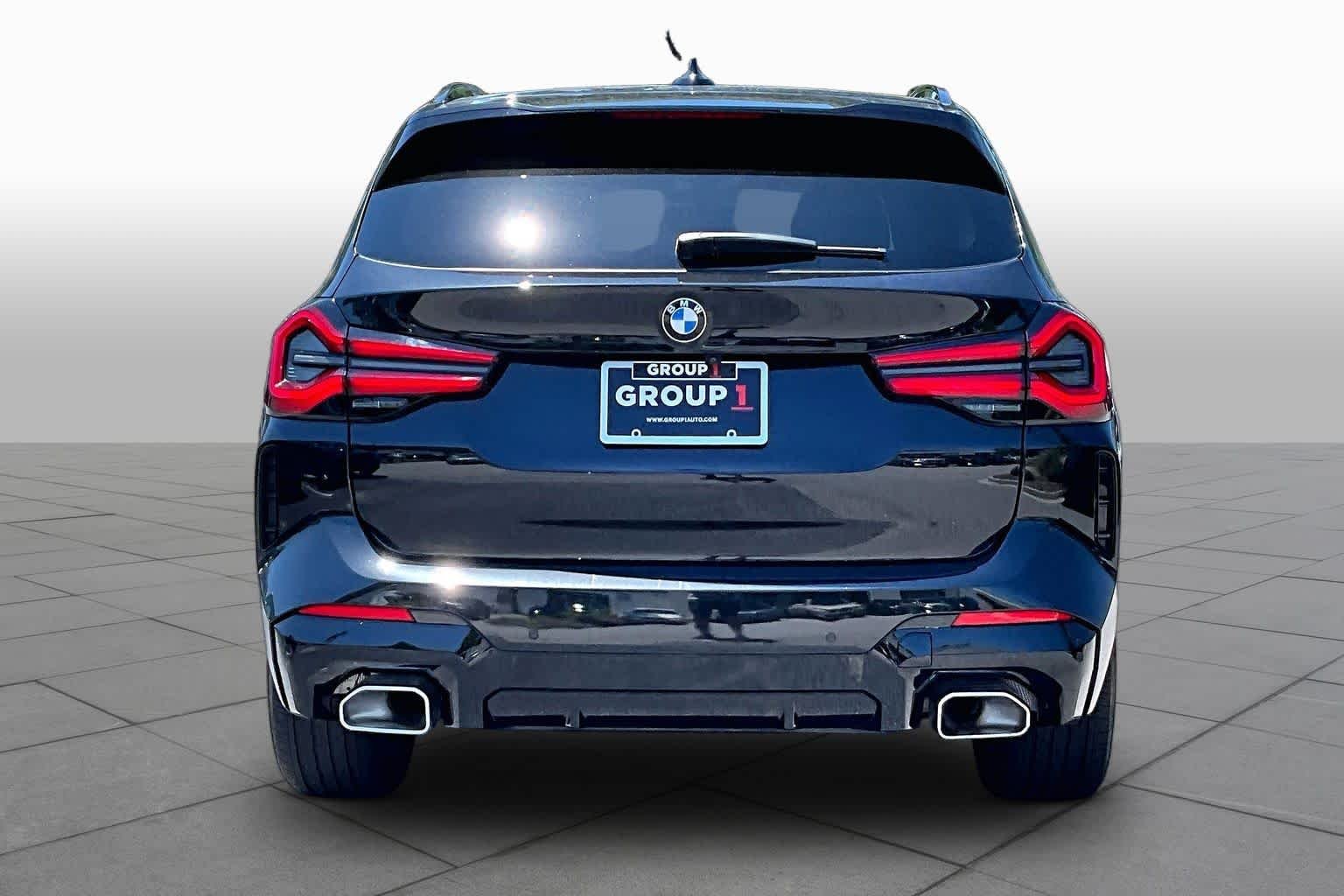 Used 2024 Black Sapphire Metallic BMW sDrive30i image 5