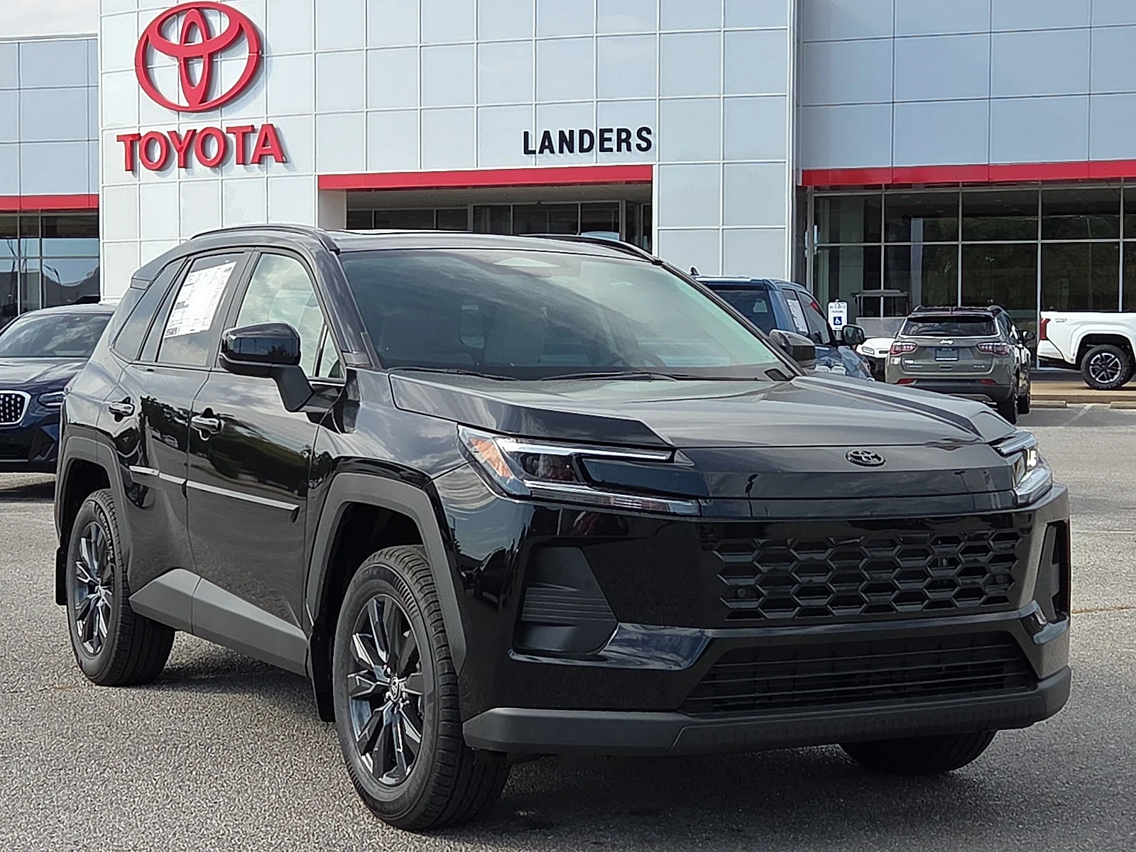 New 2026 Midnight Black Metallic Toyota XLE Premium image 1